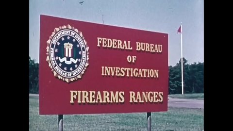 CIRCA 1974 - Shooters compete on a dueling course with electric targets at the Federal Bureau of Investigation Firearms Ranges in Quantico, Virginia.