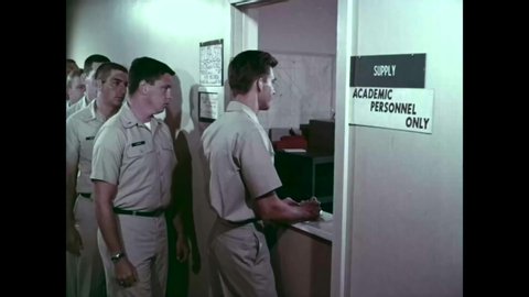 CIRCA 1966 - Students pilots are welcomed at Air Training Command, books are distributed, a photo is taken.