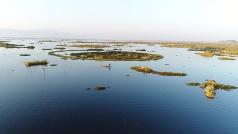 Drone footage of a guest house on a floating island on the Loktak Lake in Manipur, India