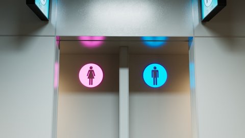 Toilets entrance. Man and woman section. Pink and blue. WC sign. Public place like airport terminal, hospital, bus or train station and any other type. Clean. Zooming-in front camera. Indoor. Corridor