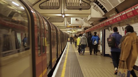 LONDON, UK - 31 JAN 2020; Departure of train in Bond Street. Commuters in London Underground sation.