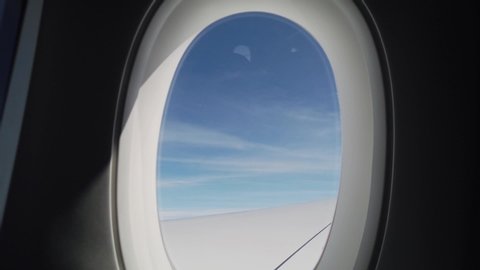 Doha, Qatar- February 2020: A View of Qatar Airways A350 Wing and Cloudy Weather Enroute to Hamad International Airport