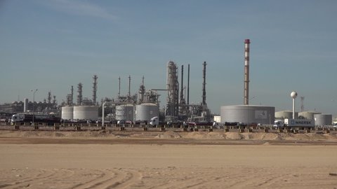 YANBU, SAUDI ARABIA – DECEMBER 2019: Slow motion driving past Yanbu petrechemical industrial zone in Saudi Arabia

