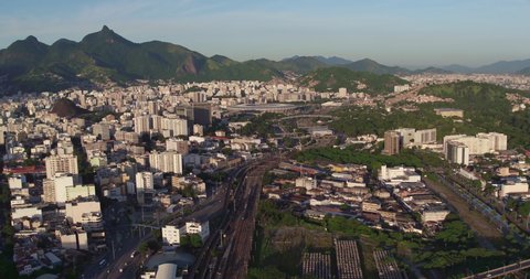 Flying above Rio De Janeiro streets and buildings, Brazil. Wide angle, morning light