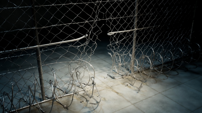 Camera and spotlight focus on the hole in prison fence. Prisoner probably left the jail. Prison break. Escape. Defection. Desertion. Getaway. Freedom. Yard. Wall. Security. Protection. Shawshank
 Royalty-Free Stock Footage #1048379098