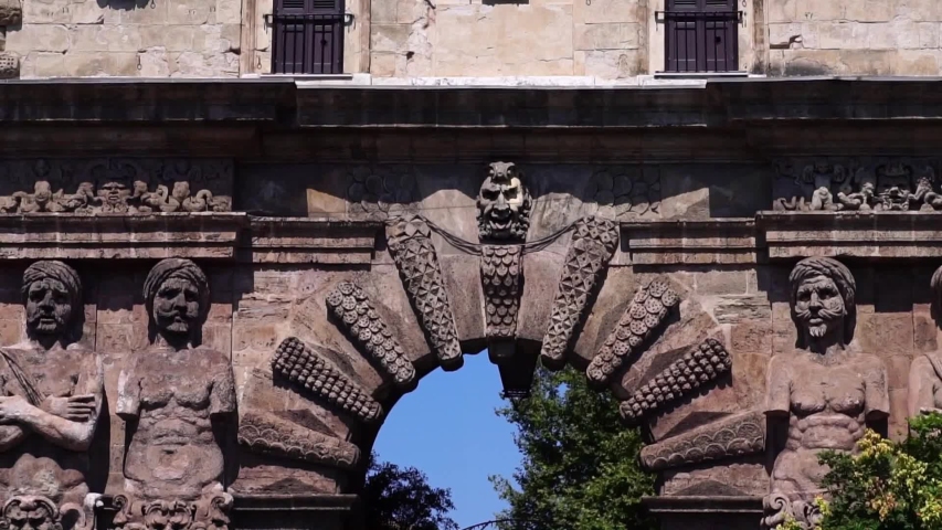 Glide shot. Gate in Palermo. Picturesque historic town in Sicily Italy. Summer tourism landmark & family travel destination in Europe. 