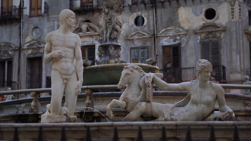 Piazza Pretoria fountain sculptures. Palermo, Sicily, Italy. Summer tourism landmark & family travel destination in Europe.