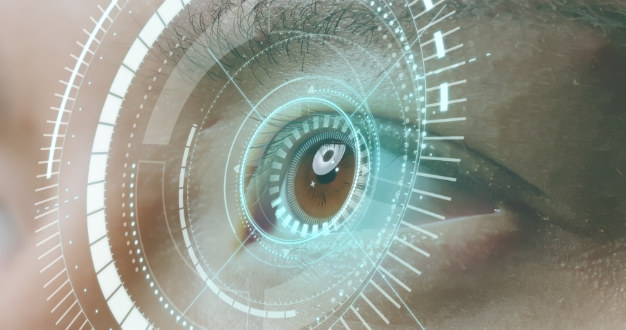 Man eye with futuristic vision system - Concept of control and security in the accesses technology