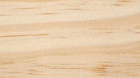Wooden board surface tracking. Wood texture close up. Wooden background. Slider shot. 4K