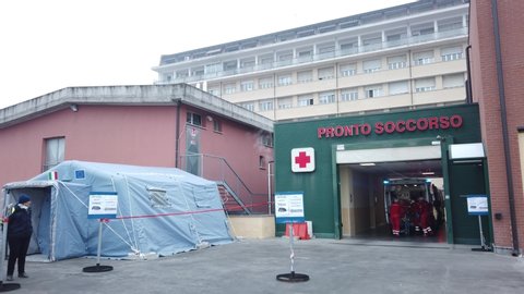 Savigliano , Piemonte / Italy - 02 25 2020: Savigliano Piemonte, Italy, February 25 2020: Ambulance in first aid, emergency tent outside, coronavirus in Italy