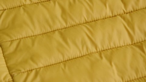 Crop view of yellow quilt