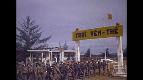 CIRCA 1962 - The Civil Guard and Civil Defense Force of South Vietnam defends bridges and waterways and directs traffic.