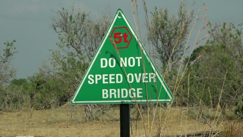 Road sign - Do not speed over bridge, Chobe National park in Botswana 
