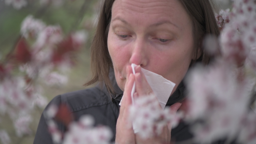 Allergens Flower Pollen Allergy Symptoms Woman Sneezes Under A Tree With Flowers In The Park 0974