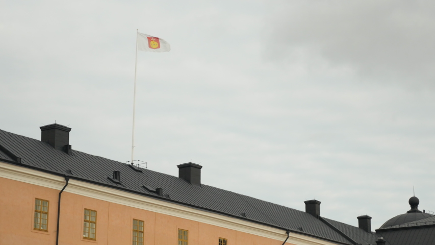 Shot of Uppsala Castle in Uppsala, Sweden, flag