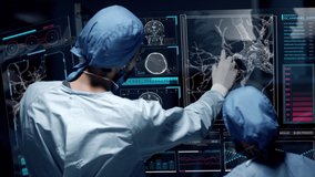 Professional doctors analyzing patient's medical MRI diagnosis by checking on a large glass screen with futuristic holograms. Concept of: medicine, doctors, future, holographic, brain scan - Powered by Shutterstock - Get 15% off with code: PIKWIZARD15
