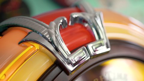 Following the water bubbles in an american vintage jukebox out of the fifties with the camera in extreme close up with a shallow depth of field