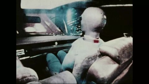 CIRCA 1981 - Cars are seen crashing with test dummies inside them, and other cars drive on the freeway.