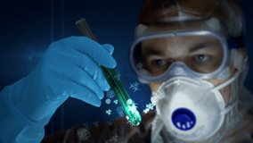 Scientist in mask and protection glasses with test-tube in glove hand. Concept of science, biology, health, medical, virus covid-19 research, coronavirus vaccine search, biohazard and cell symbols. - Powered by Shutterstock - Get 15% off with code: PIKWIZARD15