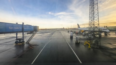LONDON, UNITED KINGDOM - OCT 24, 2019: Time Lapse of London Heathrow Airport with Icelandair flight waiting for loading luggage and top up aviation fuel before depart to the next destination.
