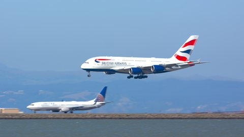 SAN FRANCISCO, CA - 2020: British Airways Airbus A380 Superjumbo Jet Airliner Landing on Runway Arriving into San Francisco SFO International Airport Flying Over the Bay Area on a Sunny Day