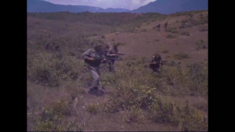 CIRCA 1962 - South Vietnamese soldiers are shown using rifles, machine guns, bazookas, mortars, and large field artillery guns.