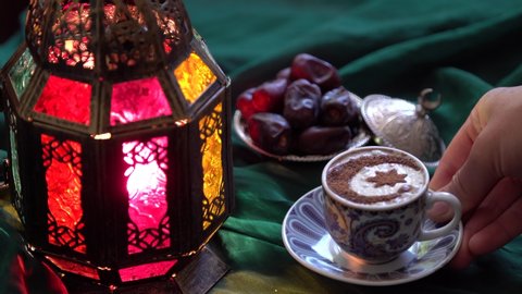 The Food of Ramadan. Cup of coffee, dates, dried fruits, sweets. Eid - Islamic holiday. Coffee stencil