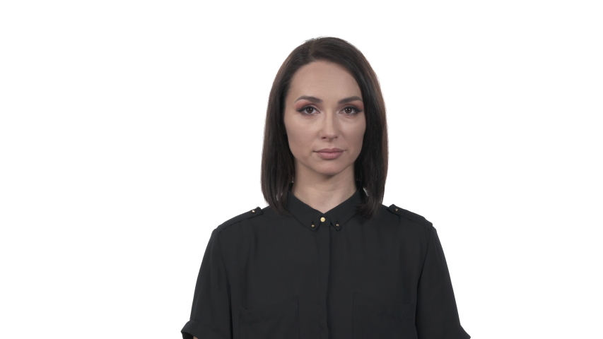 Woman putting on her glasses. Isolated, on white background
