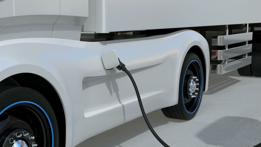 Generic design blue Heavy Electric Trucks charging at Public Charging Station. The charging station equipped  with roof-mounted solar panels. 3D rendering animation. Royalty-Free Stock Footage #1048531174