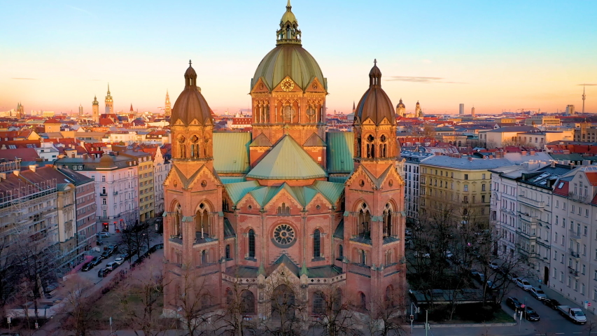 Aerial Munich Germany skyline view from above drone in 4k. View of marienplatz old town city centre town hall frauenkirche. Munich church cityscape.