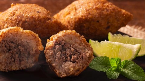 Potato Kibbeh with smoke - Middle Eastern minced meat and bulghur wheat fried snack made with potato. Also popular party dish in Brazil (kibe).
