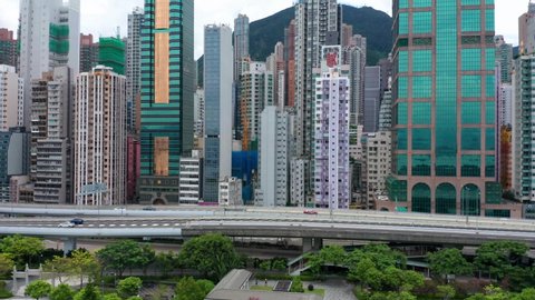 4K Aerial Drone tracking from left to right of Hong Kong Island. Drone tracks slowly from left to right for this low level shot of Hong Kong Island.