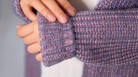 close up Shot video. Female hands move nervously. Cozy Woman Close up women wearing sweaters.winter.