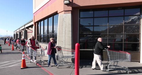 Circa - 03/17/2020 - Orem, Utah - Long line out side grocery store during pandemic for Coronavirus.