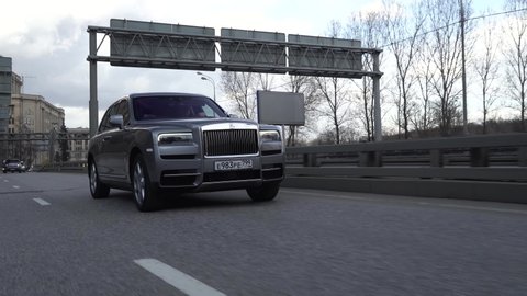 Moscow, Russia - 13 03 2020: Rolls Royce Cullinan hit the road. Driving expensive car on the streets of Moscow.