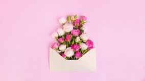 Stop motion animation opening envelope and growing flowers on pink background. Creative flat lay love spring wedding  concept - Powered by Shutterstock - Get 15% off with code: PIKWIZARD15