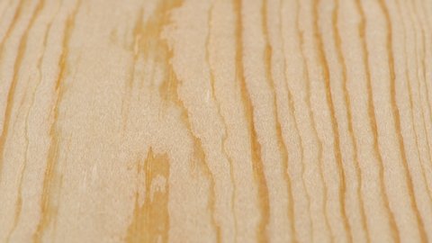 Wooden board close up tracking. Wood texture. Dolly shot. Low angle, macro. 4K