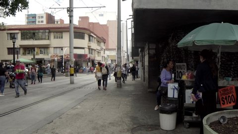 Unidentified people in downtown Medellin, Colombia, circa April 2019