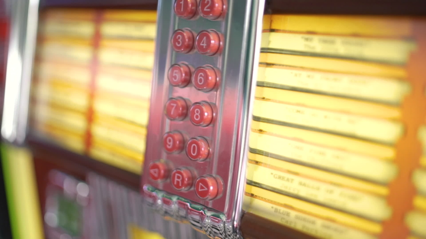 The inside of a retro and vintage american fifties juke box in close up with a shallow depth of field.