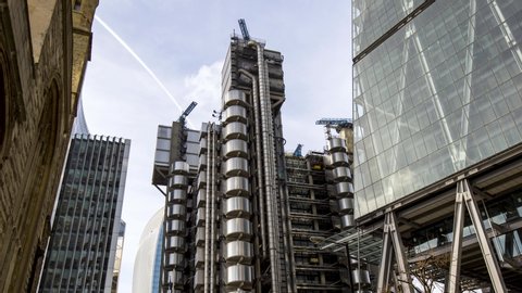 Hyperlapse of London's Lloyds Building in the day. Camera tracks in to a very dynamic angle.