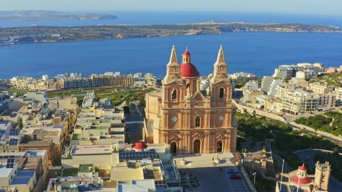Aerial view of Mellieha Parish Church or Birth of Our Lady. Camera moves circle. Malta country