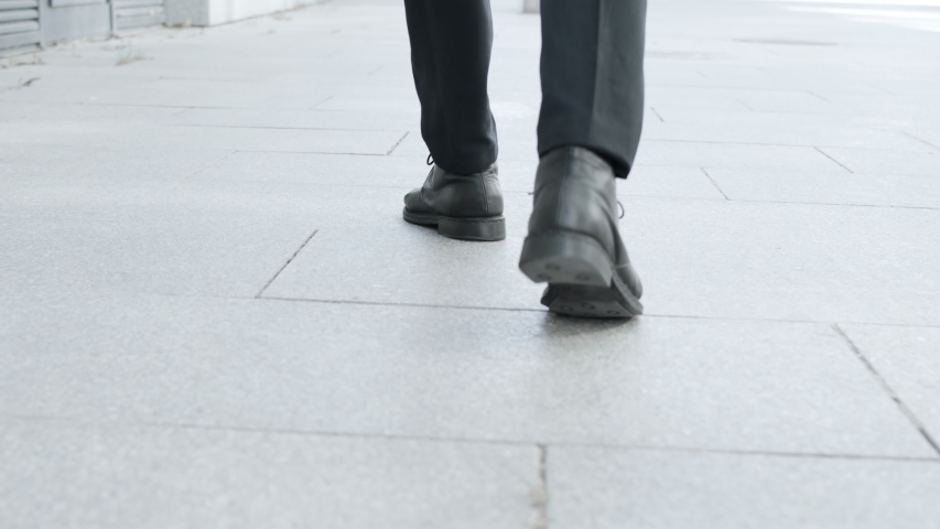 back view anonymous businessman feet walking Stock Footage Video (100% ...