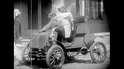 CIRCA 1910s - A history of the American automobile newsreel includes humorous moments of early car history.