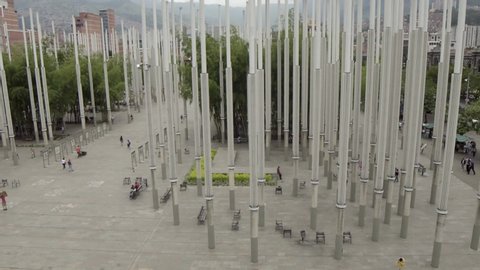 Unidentified people at the Parque De Las Luces (Park of Lights) in Medellin, Colombia, circa April 2019. The Parque De Las Lucas is a popular attraction in El Centro in Medellín with 300 light poles.