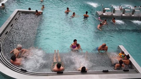 Yekaterinburg, Russia, October,26, 2019. People bathe in the outdoor pool. Hot spring pool. People are in the jacuzzi.
