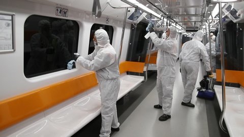 13 MARCH 2019, ISTANBUL,TURKEY, Employees are disinfects a train to due to the pandemic  coronavirus COVID-19.
