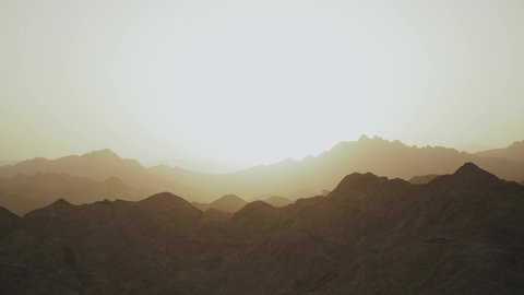 Amazing sunset at Egypt Sinai mountains, Sinai desert, mountains peaks, silhouette of mountains, flat, slow motion, 4k