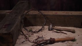 4K: Crown of thorns on Cross of Jesus Christ at Easter. Tracking shot of the crucifixion scene with Nails, Hammer & whip. Stock Video Clip Footage - Powered by Shutterstock - Get 15% off with code: PIKWIZARD15