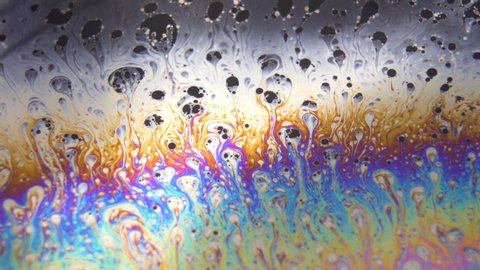 Colorful Liquid and bubbles moving creating relaxing background