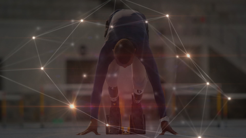 Animation of network of connections and data processing, mixed race male disabled athlete with prosthetic legs exercising at a sports stadium, starting race from starting blocks on a racing track in - Powered by Shutterstock - Get 15% off with code: PIKWIZARD15